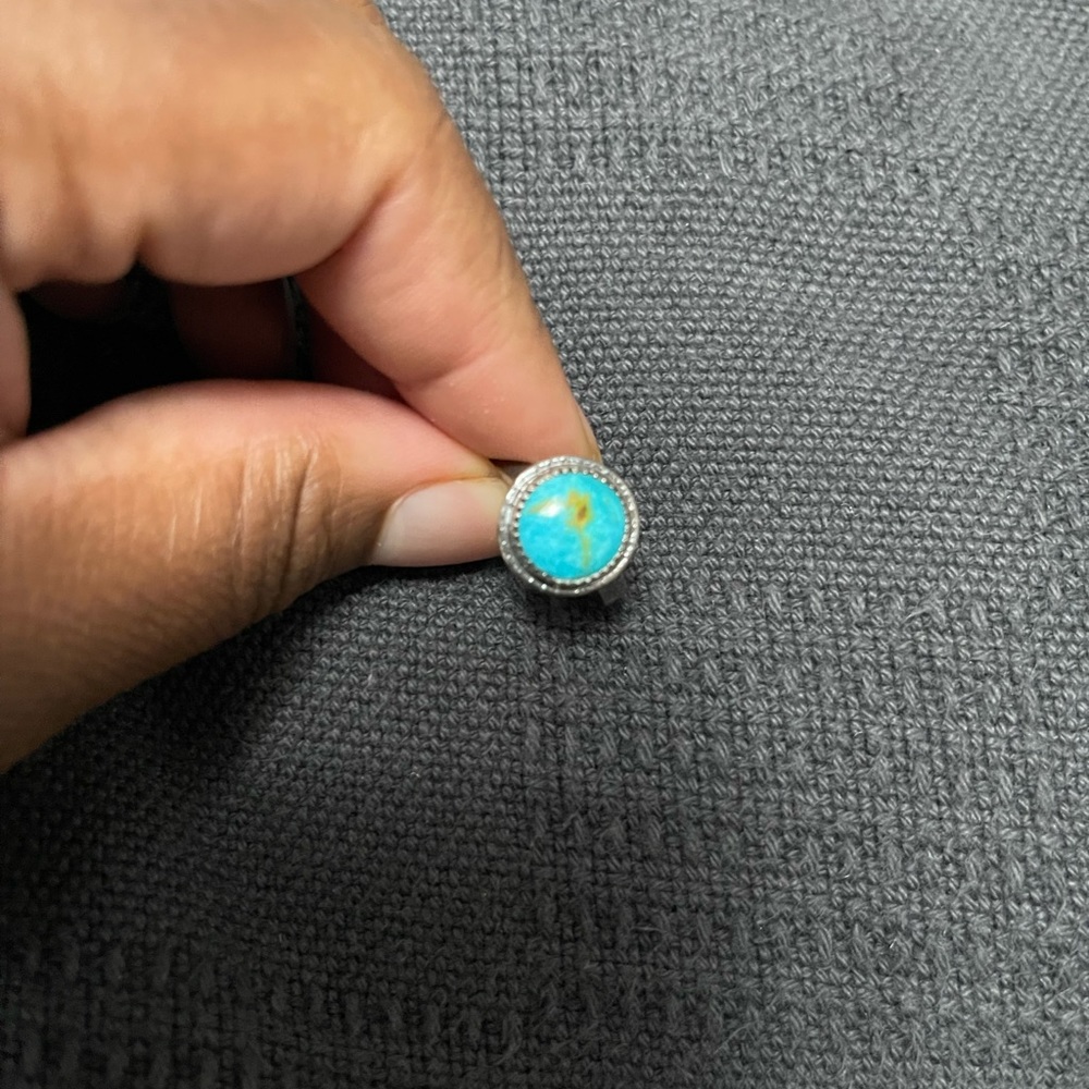 Turquoise ring.
